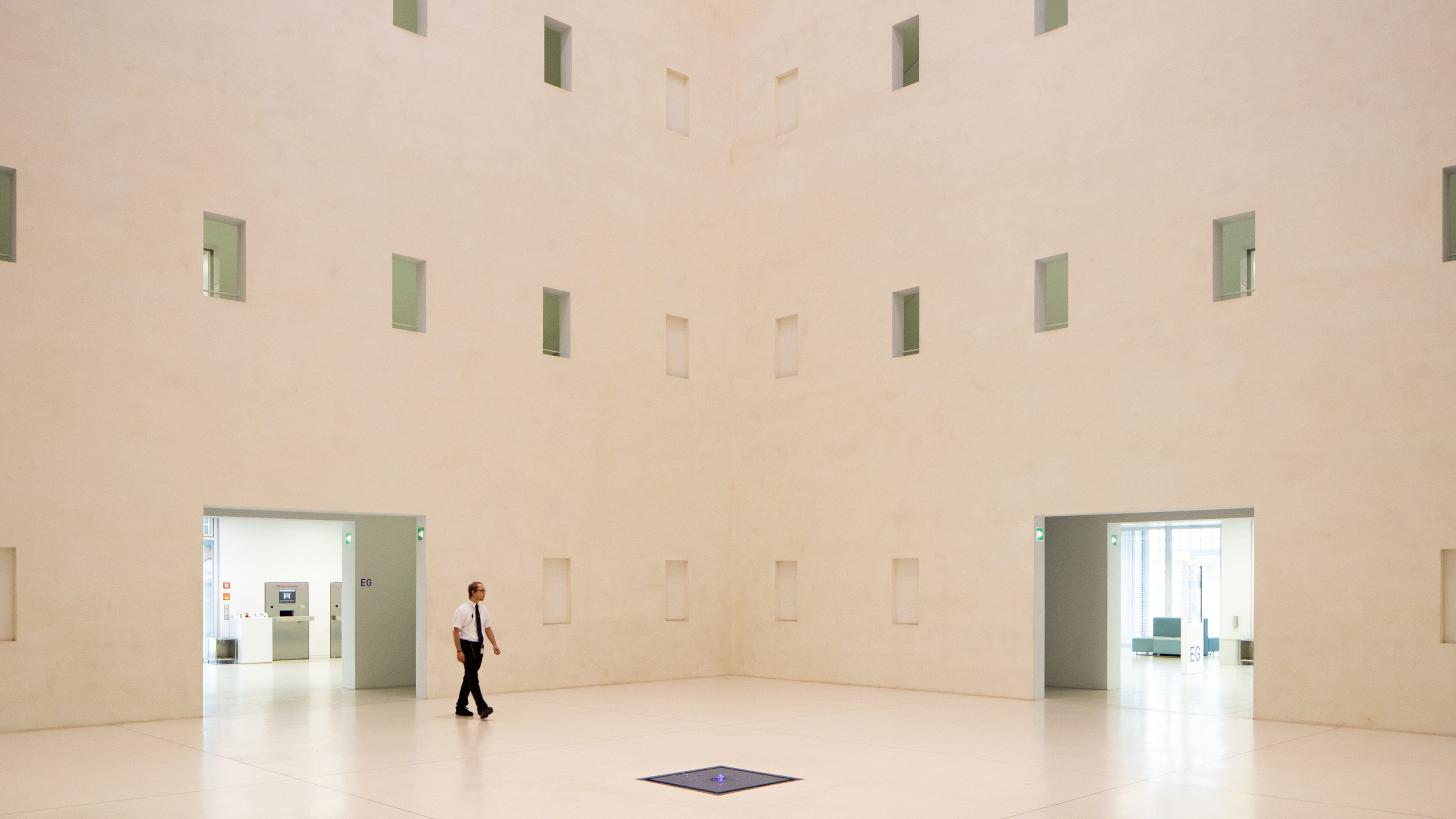 Public Library Stuttgart featuring interior views as well as an individual male