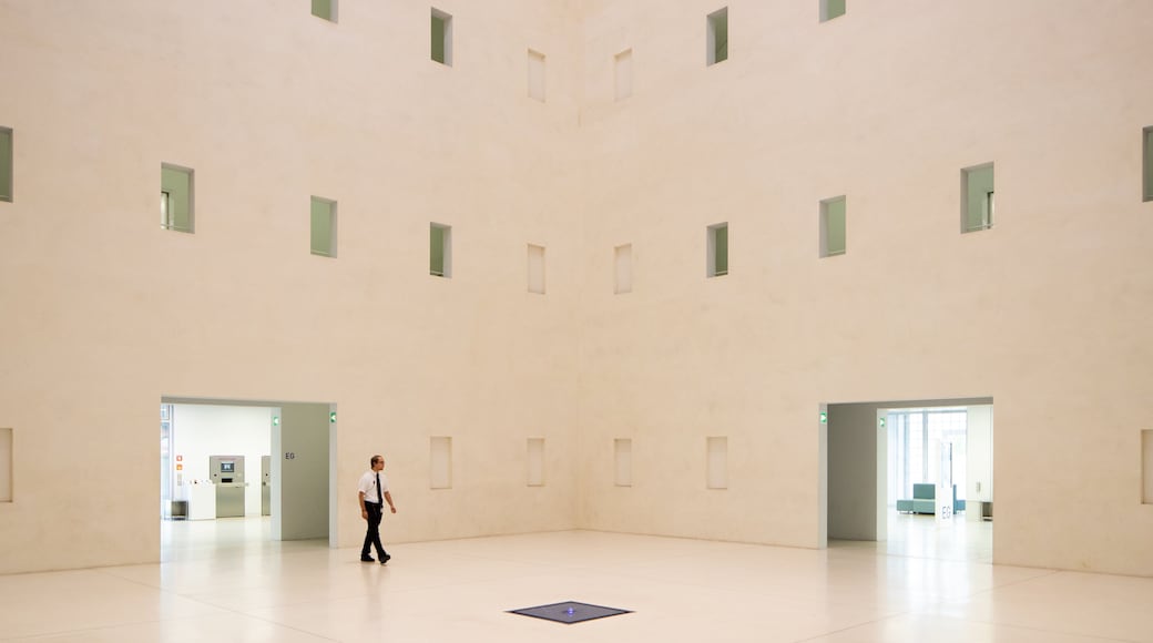Public Library Stuttgart featuring interior views as well as an individual male