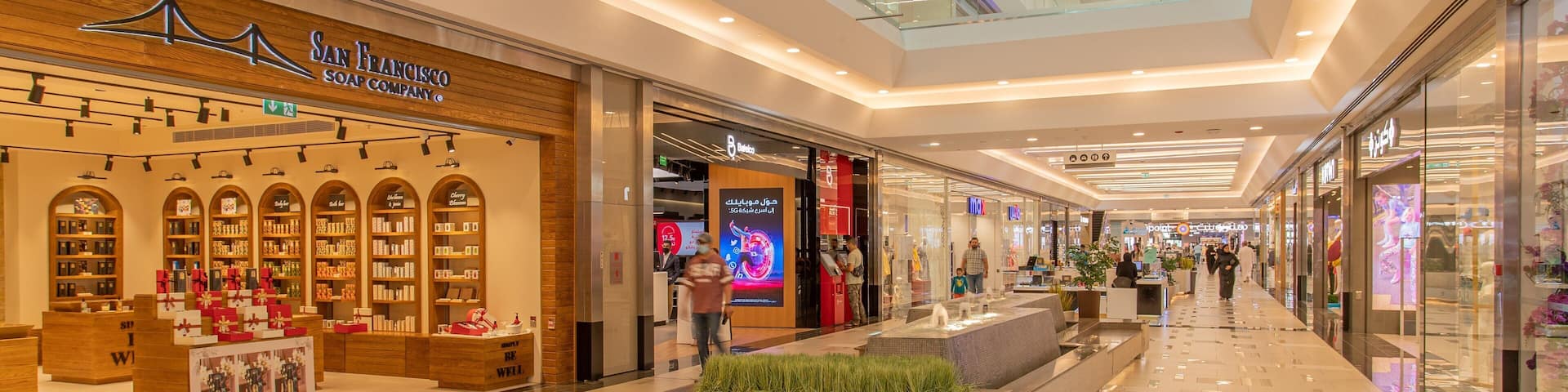 Oasis Center Juffair which includes shopping and interior views