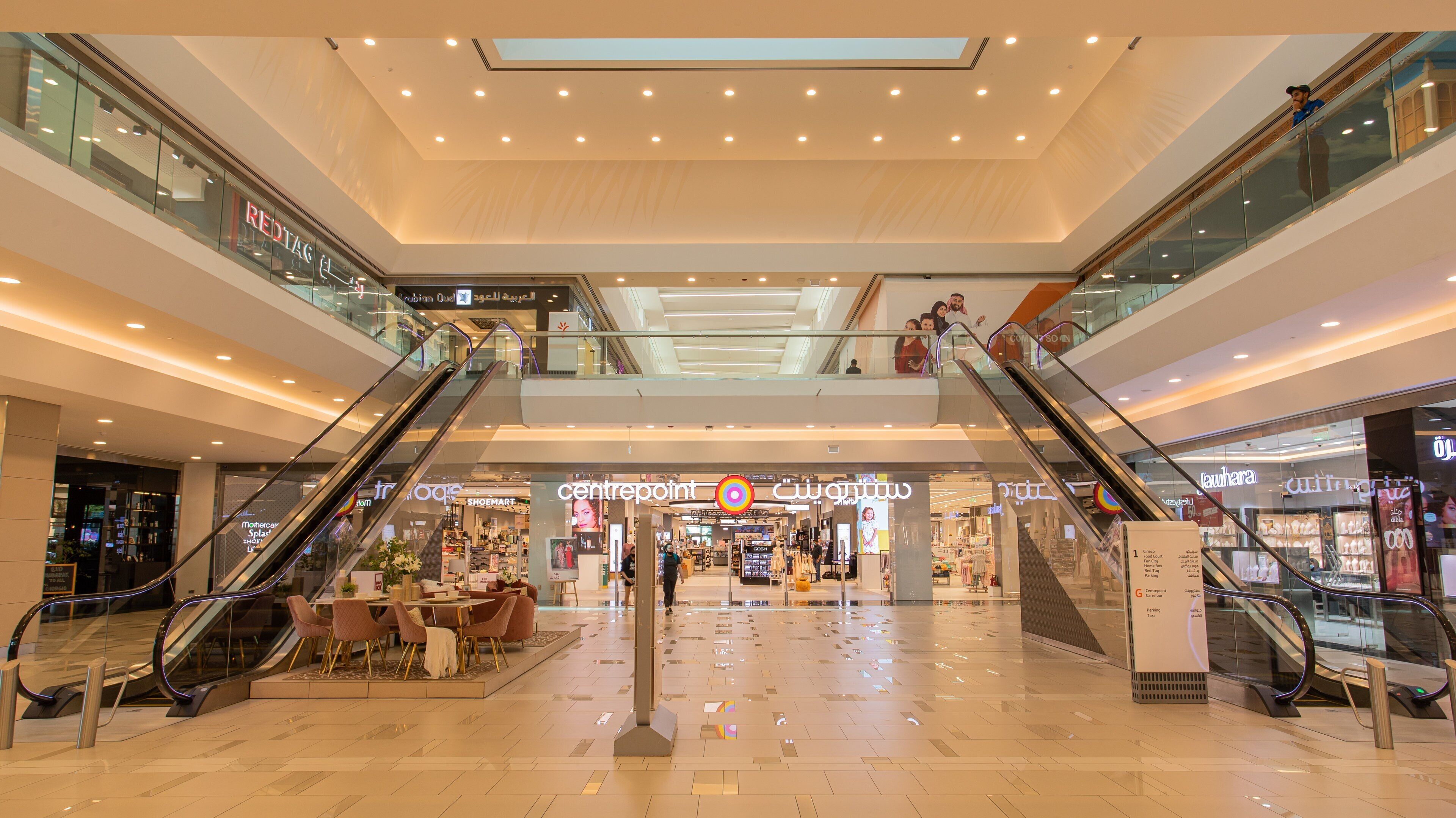 Oasis Center Juffair featuring shopping and interior views