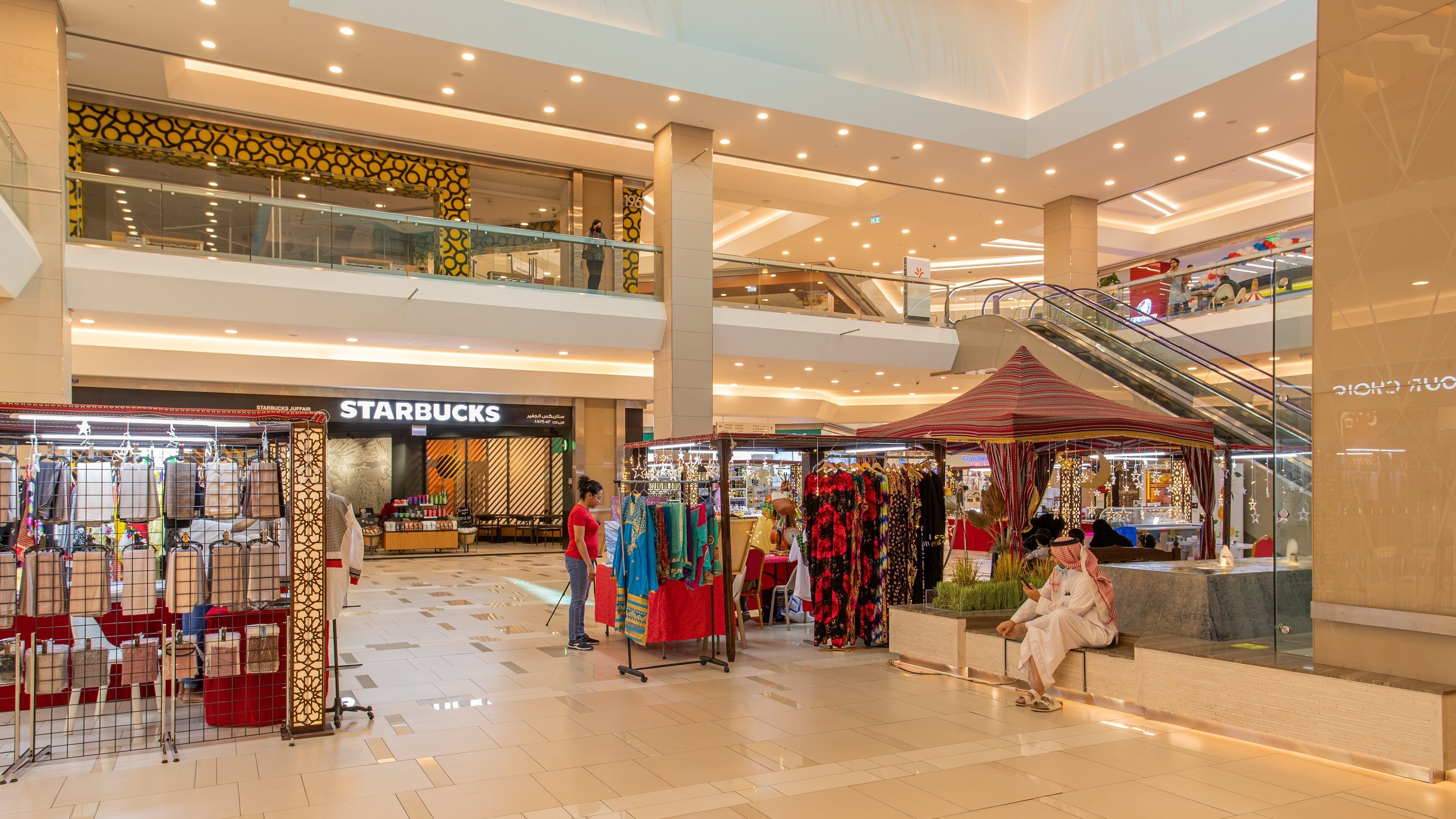 Oasis Center Juffair featuring shopping and interior views