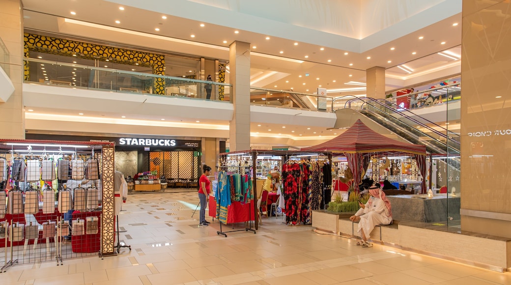 Oasis Center Juffair featuring shopping and interior views
