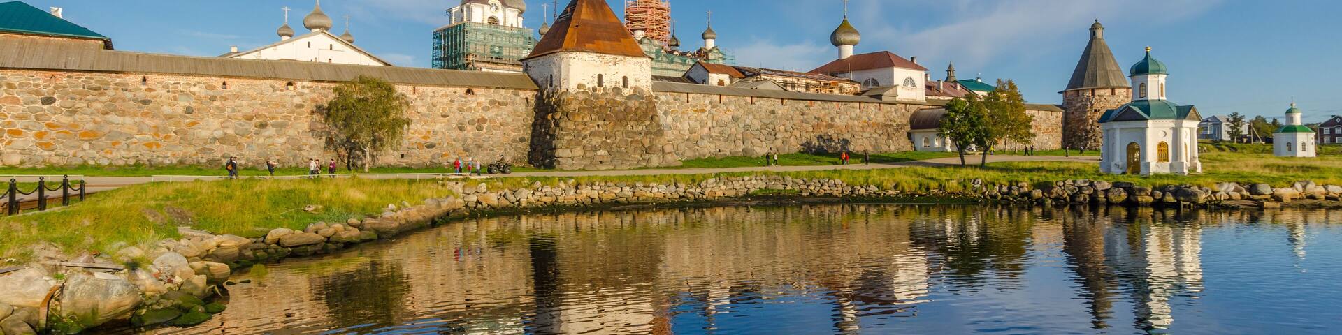 View of the Solovetsky Kremlin in the evening with reflection.