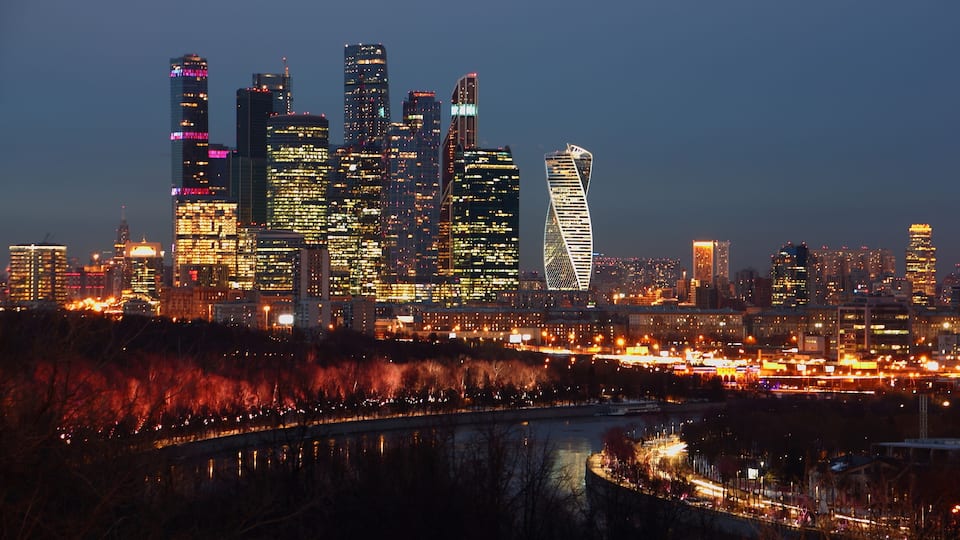 Russian business center Moscow city and Moscow river, view from Vorobyovy Gory observation deck on a winter evening