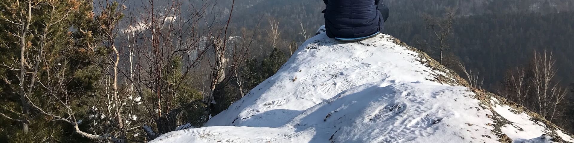 Not far outside of the Siberian city Krasnoyarsk you find the nature park Stolby. Famous for its rock formations it’s also nice for just sitting and enjoying the views. It might get a bit cold in winter though ;)