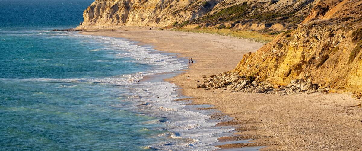 Port Willunga Beach featuring general coastal views, rugged coastline and a sandy beach