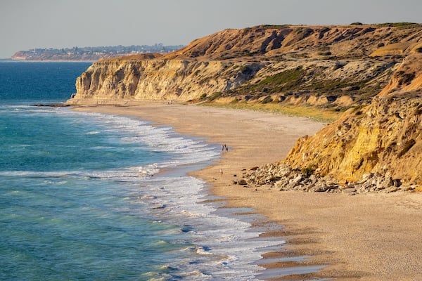 Port Willunga Beach featuring general coastal views, rugged coastline and a sandy beach