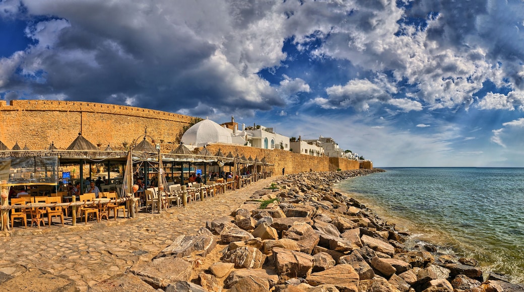 HAMMAMET, TUNISIA - OCT 2014: Cafe on stony beach of ancient Medina on October 6, 2014 in Hammamet, Tunisia