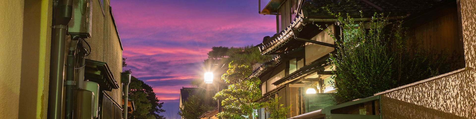 Nagamachi Samurai District which includes a sunset and night scenes