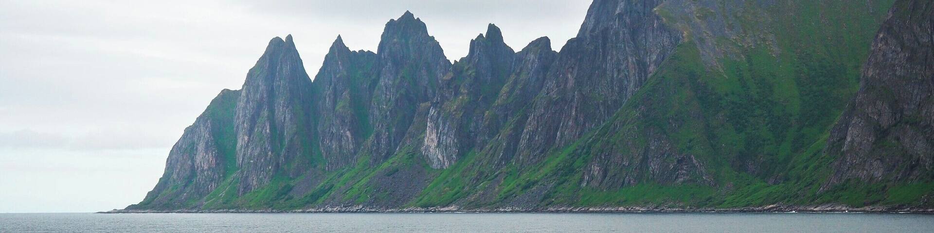 This is the Tungeneset viewpoint on the island of Senja. Senja is not as well-known as the Lofotens Islands in Norway, but just look at that view! Be sure to make some time for a stop here if you're driving the national tourist routes across Senja.