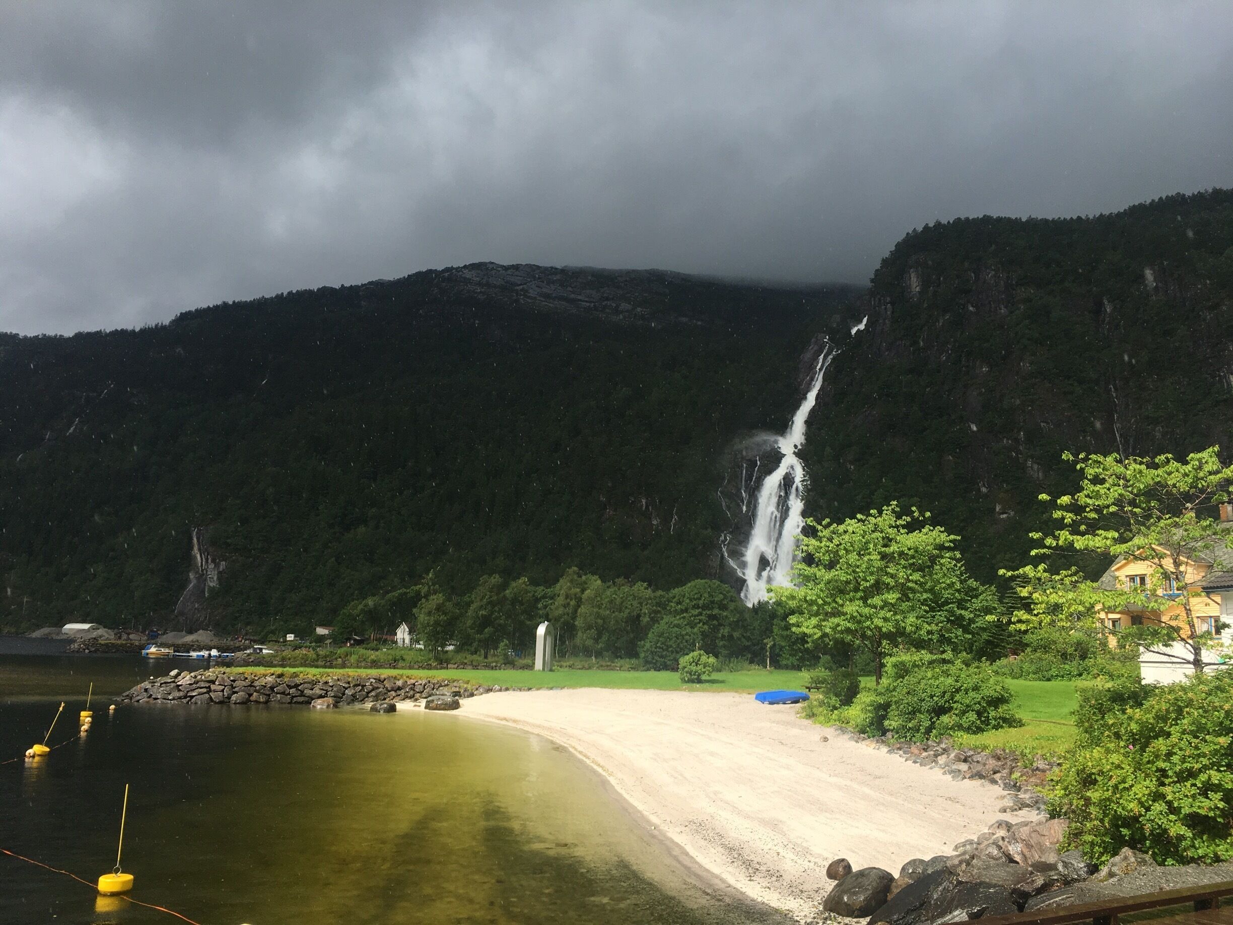 Tiny beach with a waterfall in the background - the sun gave me a wonderful spotlight on the beach 