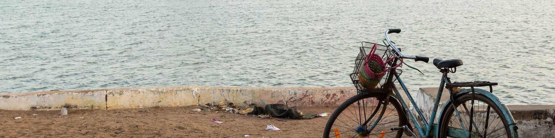 A bicycle parked on the banks of the Cauvery river in the village of Thirvaiyaaru.