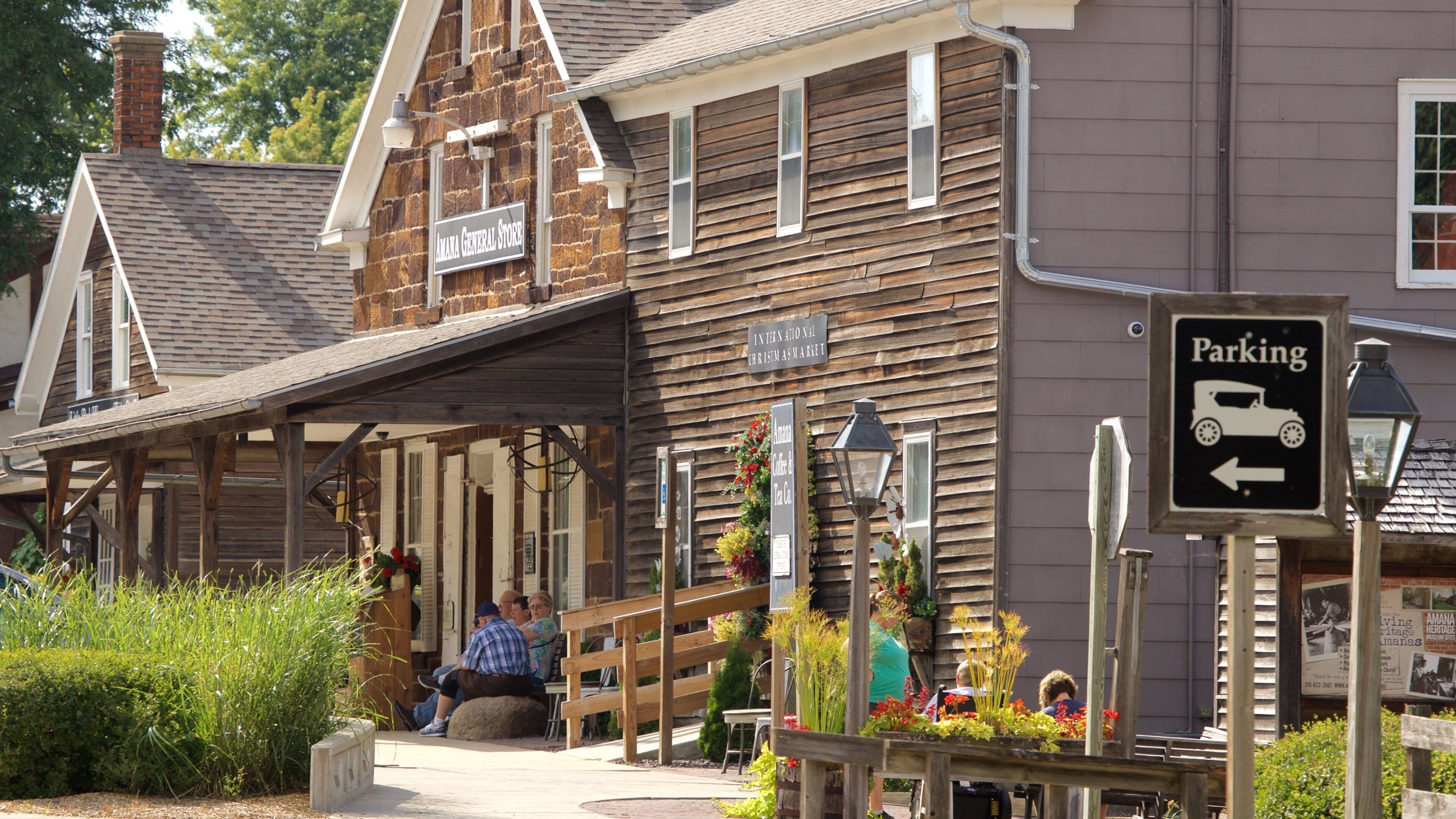 Amana Colonies featuring a small town or village, a house and signage