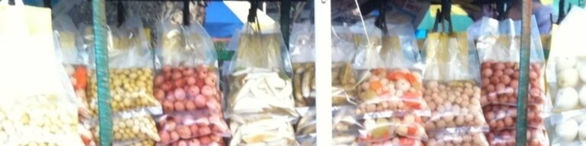 Assorted fruits and veggies brined - displayed at a road side vendor cart near Thalikkulam, Kerala