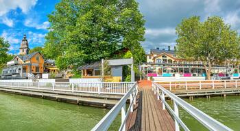 Panoramic cityscape with embankment and marina in Naantali town at sunny summer day. Finland