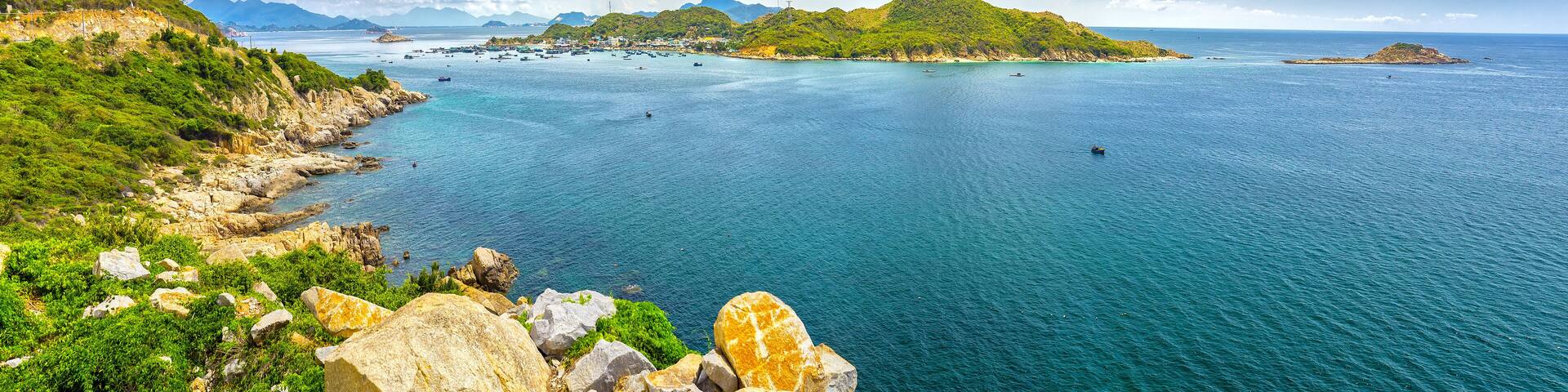 Beautiful panoramic landscape of Vietnam beach at Vinh Hy, Ninh Thuan, road along beach, small island, waves make, fresh air make fantastic holiday when travel at Viet Nam in summer or spring