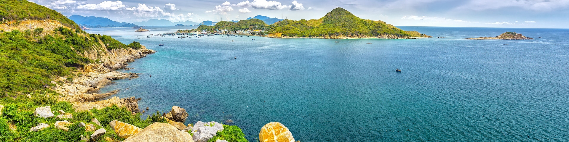 Beautiful panoramic landscape of Vietnam beach at Vinh Hy, Ninh Thuan, road along beach, small island, waves make, fresh air make fantastic holiday when travel at Viet Nam in summer or spring