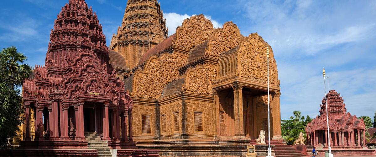 A large, intricately carved temple with multiple spires and detailed architecture.