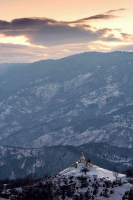 Sunset over little chapel.