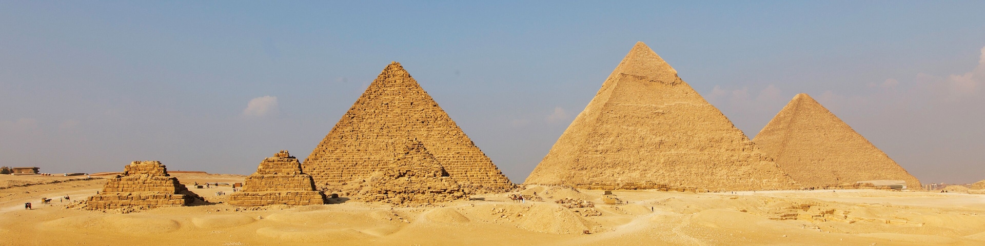 Egypt. Cairo - Giza. General view of pyramids from the Giza Plateau (on front side 3 pyramids popularly known as Queens' Pyramids; next: the Pyramid of Mykerinos, Chephren and Cheops)
