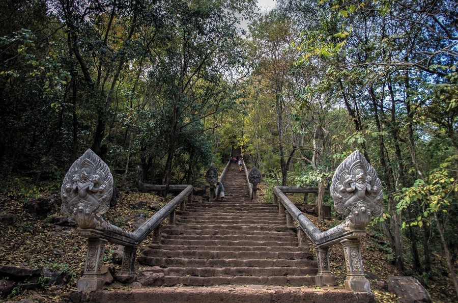 Built in the 10th century on the top of a hill, the temple is reachable by climbing a long flight of steps. Like in many of the temples in Angkor, there’s a coexistence of Hindu and Buddhist elements and it reminds, in a much smaller scale, the majestic Angkor Wat. The most scenic part, in my opinion, is the stairs. The 370 steps are framed by lushy trees that offer shade during your hike and it steep verticality, drag your eyes to the top temple.
http://nomadswind.com/cambodia-travel-diary-2-battambang-2/
