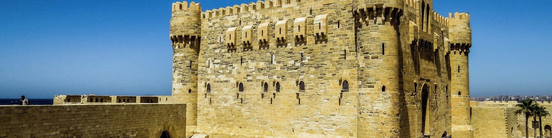Qaitbay Citadel in Alexandria, Egypt, which is a 15th-century defensive fortress located on the Mediterranean sea coast. It was established in 1477 AD by Sultan Al-Ashraf Sayf al-Din Qa'it Bay.