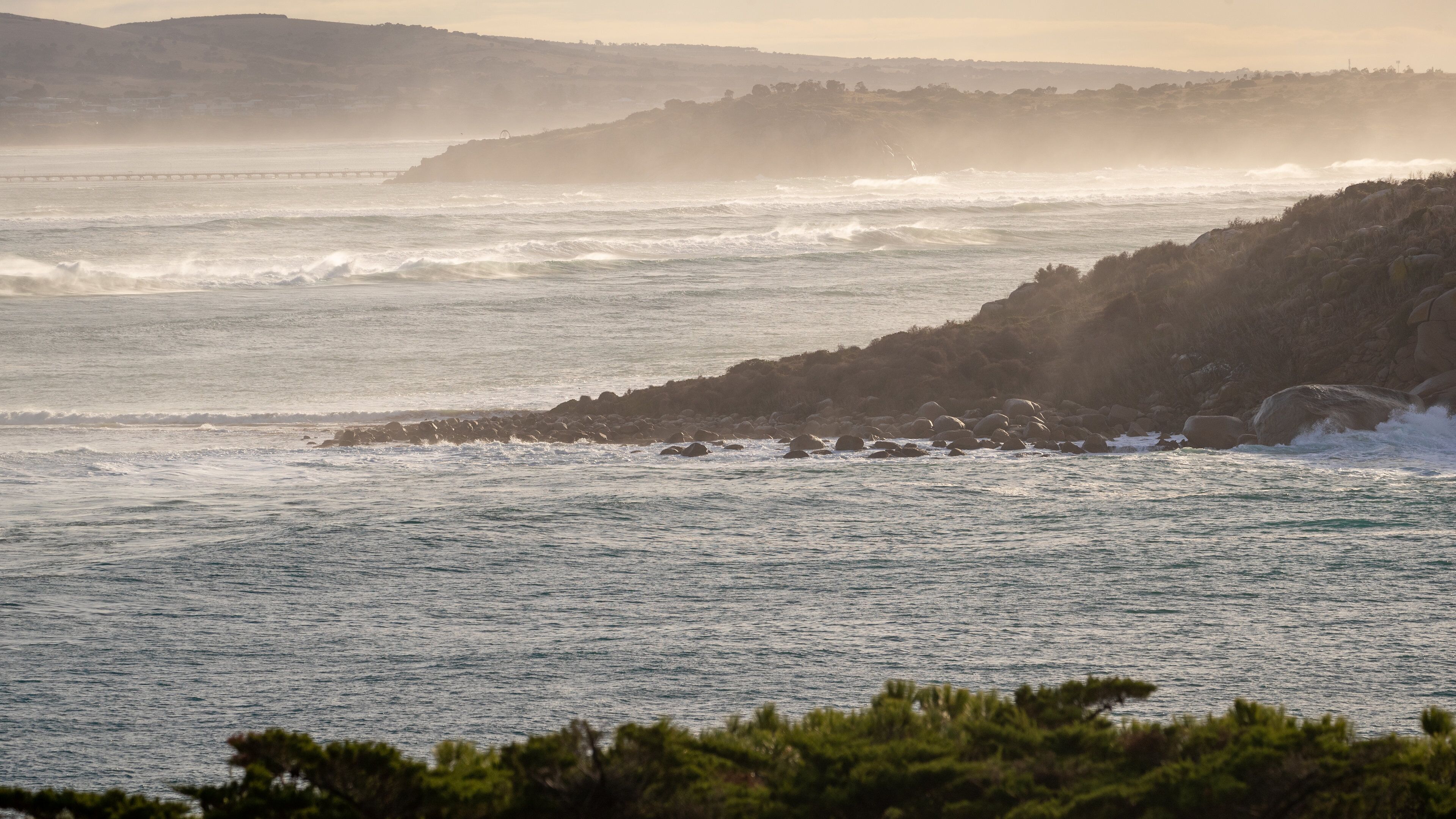 The Bluff featuring rugged coastline, a sunset and general coastal views