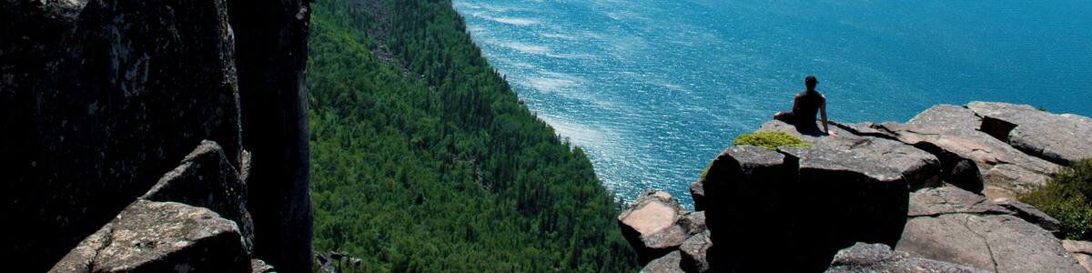 Once you reach the top of the peak where the bench is you have to continue to walk for another 20 or so minutes to reach this area. It's not hidden so as you continue through various open areas you will just have to keep going until you arrive.
