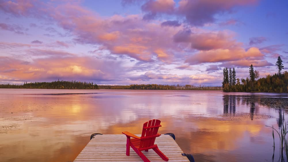 chair on dock, Lynx Lake, Lac la Ronge Provincial Park,Saskatchewan, Canada