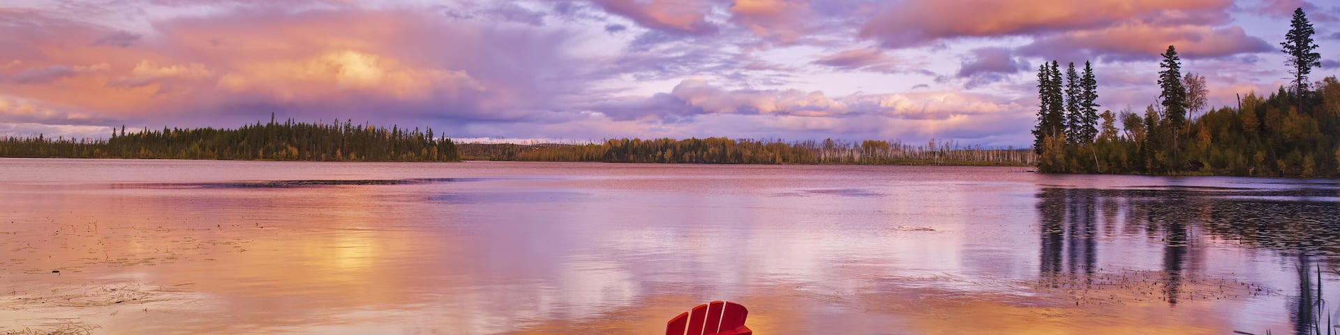 chair on dock, Lynx Lake, Lac la Ronge Provincial Park,Saskatchewan, Canada