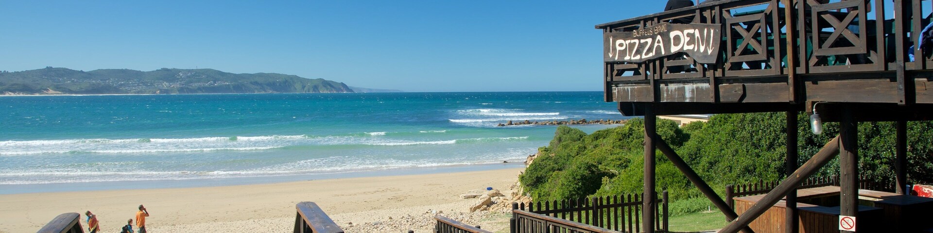 Knysna que incluye comidas al aire libre, un bar en la playa y una playa de arena