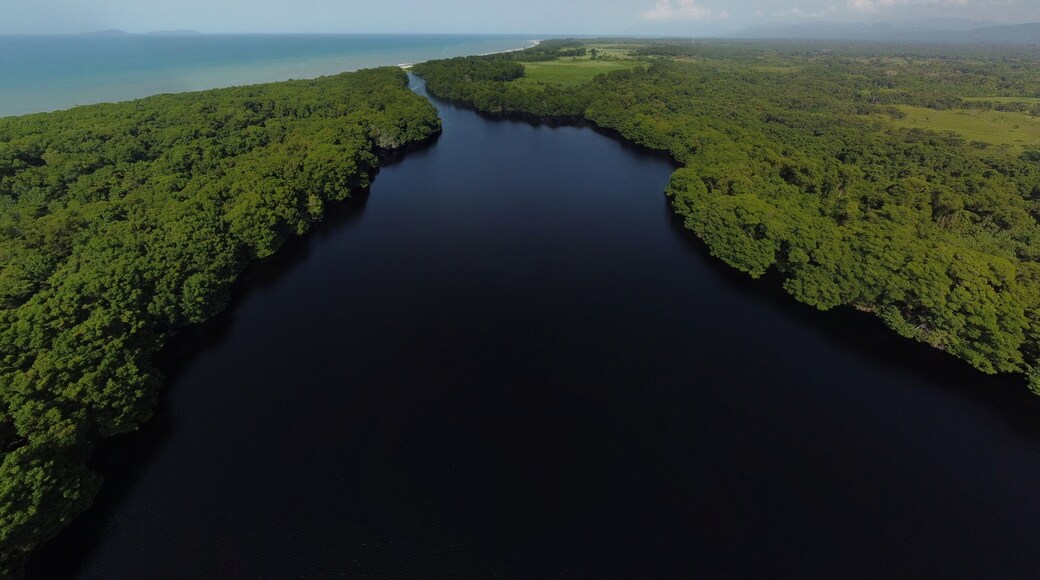 Aerial bird's eye view photo taken by drone of a lagoon in Honduras. Jutiapa Honduras. Laguna de Cacao, Honduras