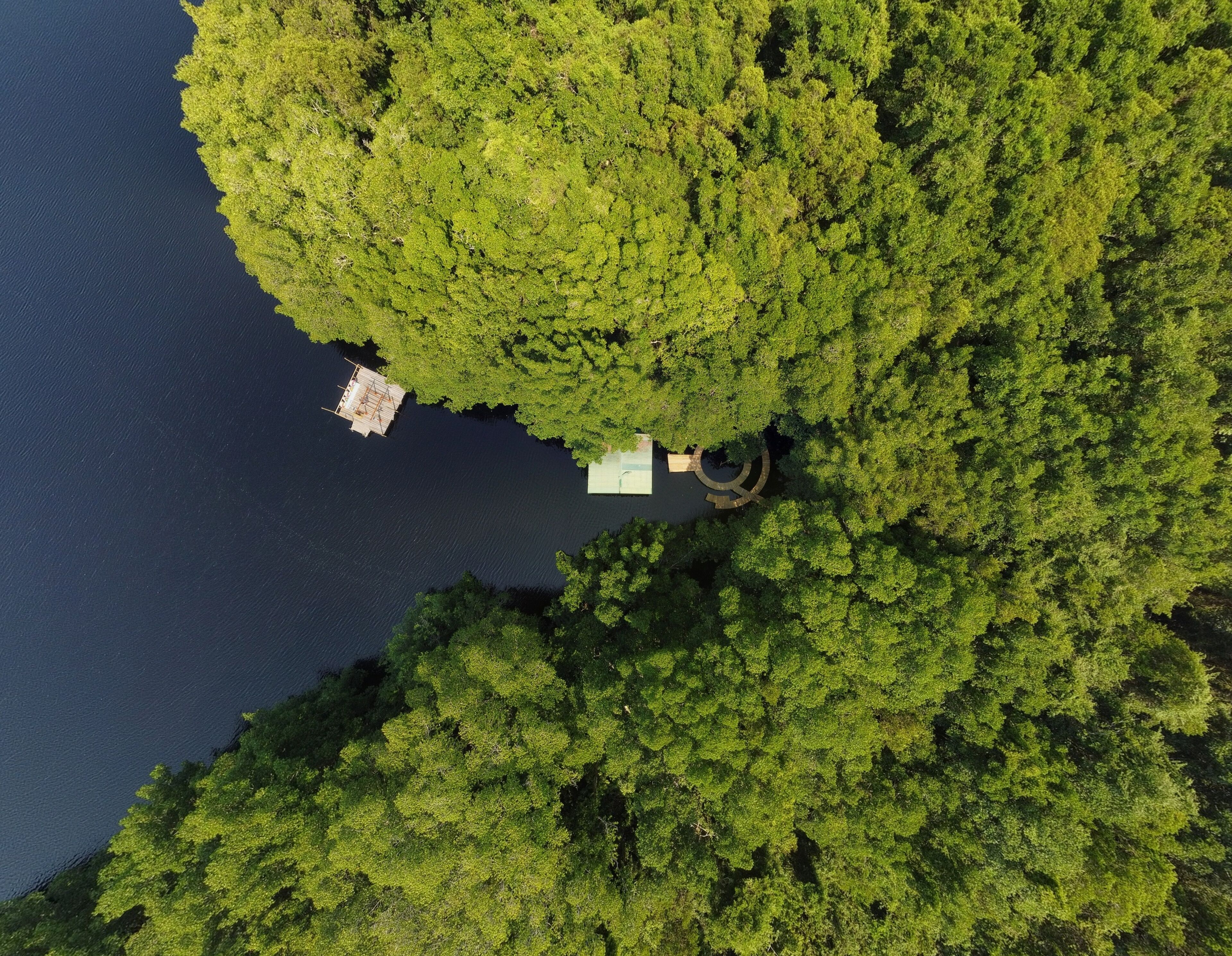 Aerial bird's eye view photo taken by drone of a lagoon in Honduras. Laguna de Cacao. Jutiapa, Honduras