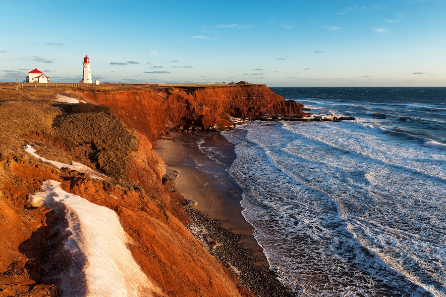 The Anse-a -la-Cabane lighthouse at sunset on Havre Aubert Island, Quebec, Canada; Shutterstock ID 389337082