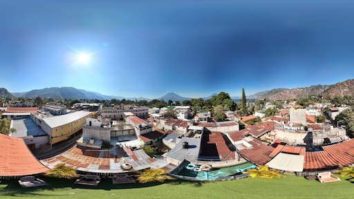 360 aerial photo taken with drone of rooftop terrace overlooking Lake Atitlán in Panajachel, Guatemala