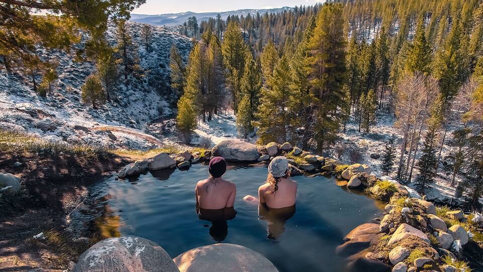 Tourists relaxing in hot spring near Bridgeport, California, USA