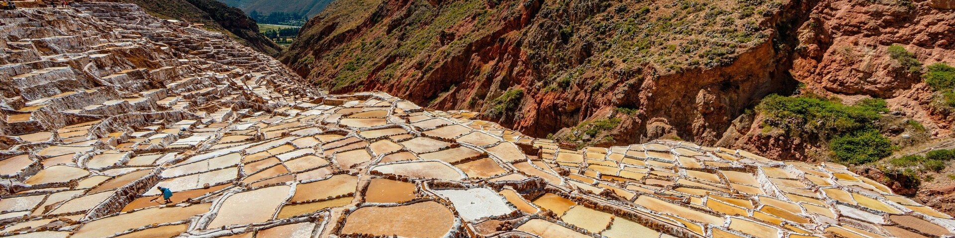 It's believed that the salt pans were originally constructed by the Wari civilization, which predates the Inca. However, the Inca saw the economic opportunity in harvesting the salt of Maras and expanded the salt pans further up the mountainside. #Culture