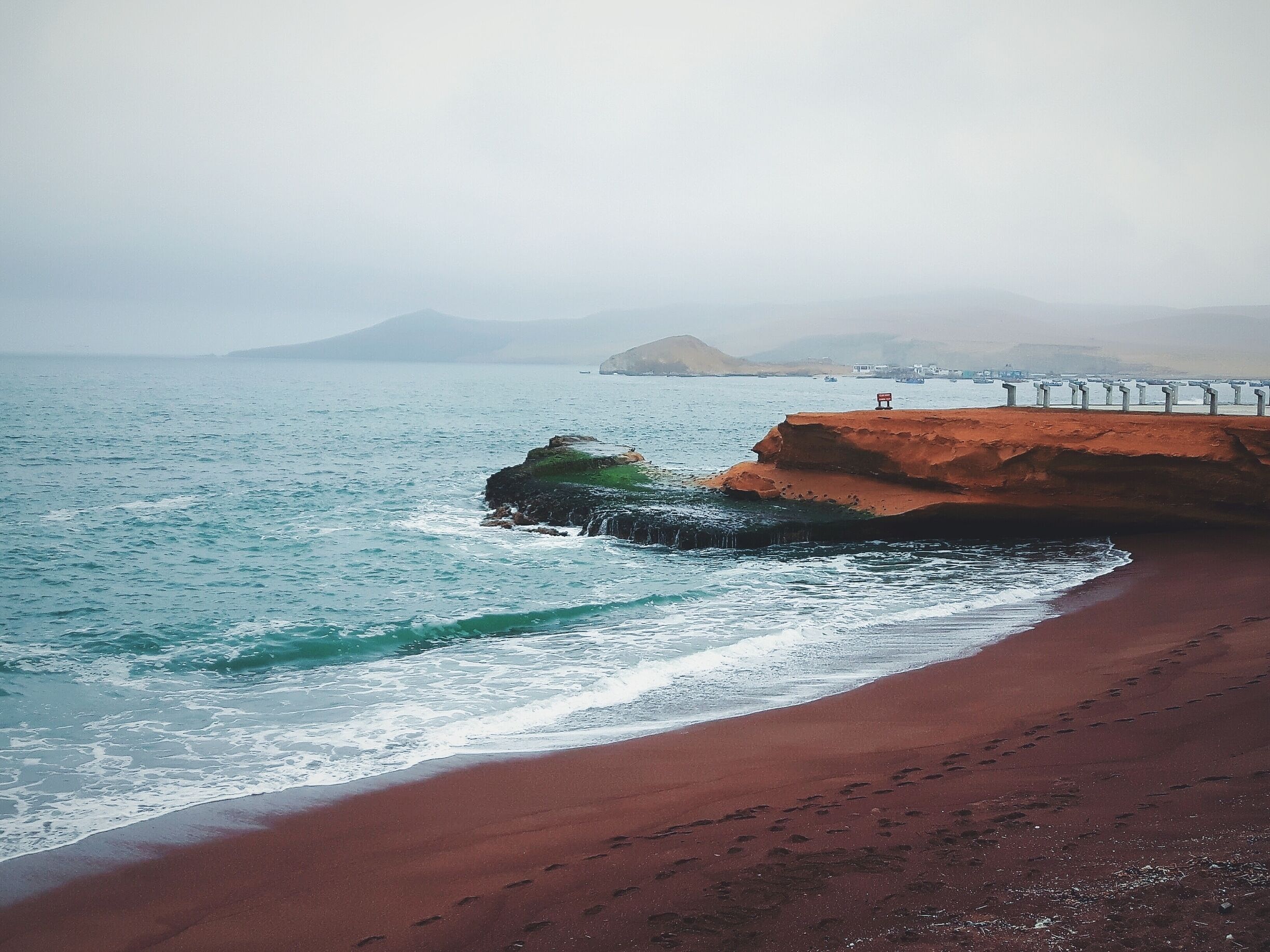 The red sand beach near the capital of Lima. 