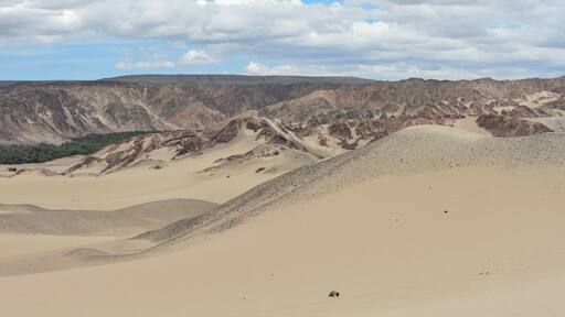 Panoramic views over a river valley in the deserts of Ica, Peru