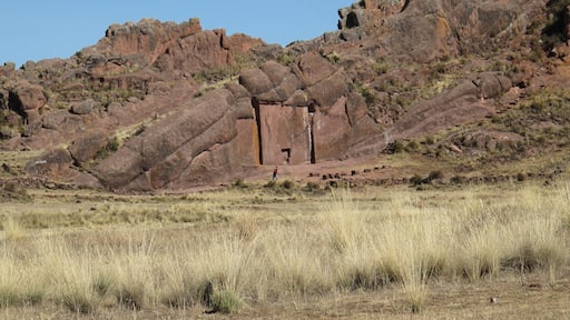 It's believed as the throne of first Inca King. The seat was built on the back of sleeping dragon. Locals tell different stories about the throne.
To access here, take a minibus towards "Juli" from terminal Terrestre in Puno, ask the driver to drop you at Aramu-muru. You will easily find the path to the entrance. The admission fees were about S10 in 2013.
June, 2013