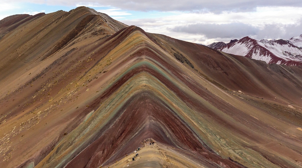 Adventure somewhere over the rainbow. After a 2-day, 17-mile trek around Nevado Ausangate we arrived at Vinicunca, also known as Montaña de Siete Colores, or Rainbow Mountain. This mountain sits a little over 16,000 feet and was only recently discovered after the snow and ice covering the mountain thawed. The rainbow colors are caused by different minerals deposited in the soil. If you plan on taking an adventure to this location, a few days of acclimation to higher altitude in Cusco is advised.
#Peru #Adventure #Vinicunca