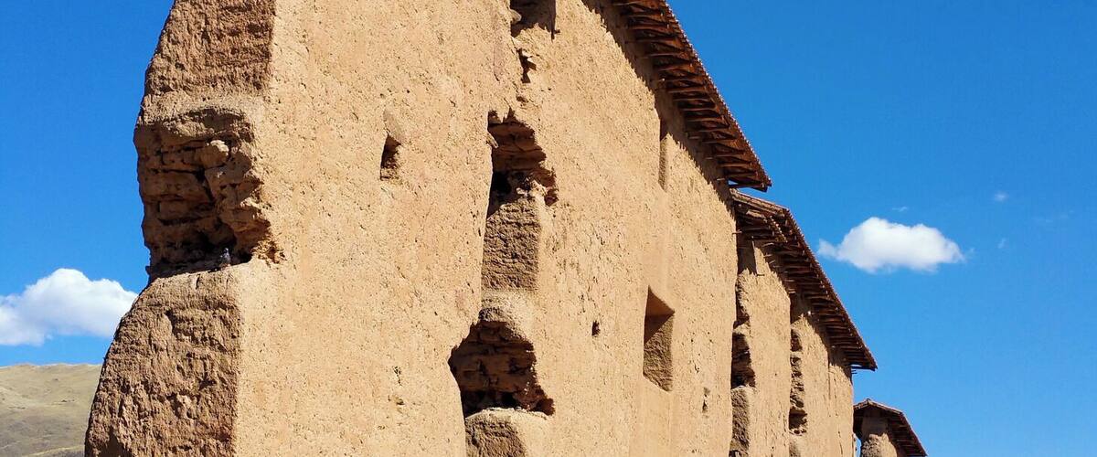 Ancient stone ruins with a clear blue sky.