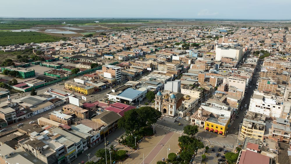 Aerial shot of the main park, church and city of Tumbes, Peru