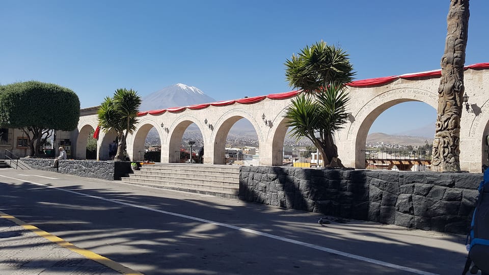 Volcán Misti in the background. Lovely arch architecture. Peru