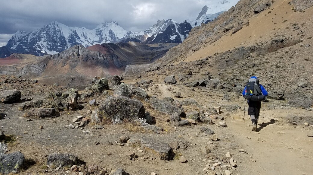 Day 8/9. On our way down to the final camp of our Huayhuash circuit. Clouds were moody, but 0% precipitation the entire time.