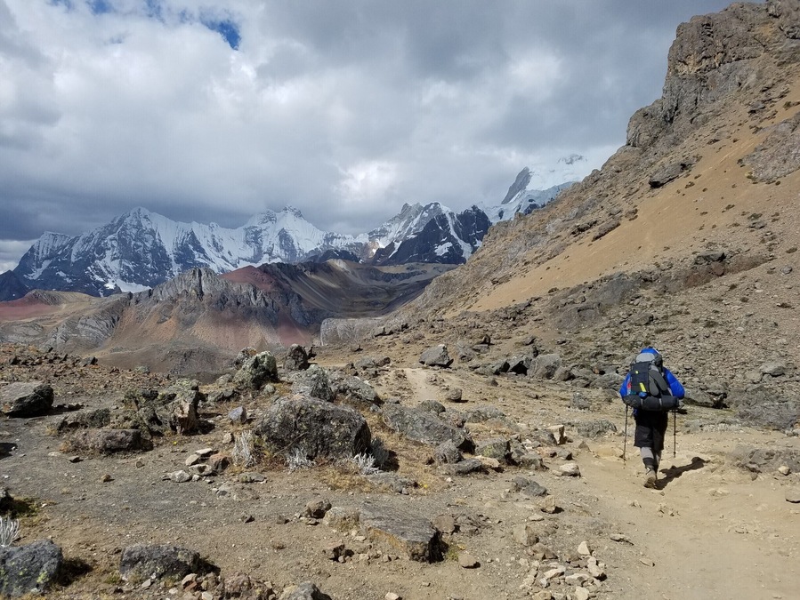 Day 8/9. On our way down to the final camp of our Huayhuash circuit. Clouds were moody, but 0% precipitation the entire time.