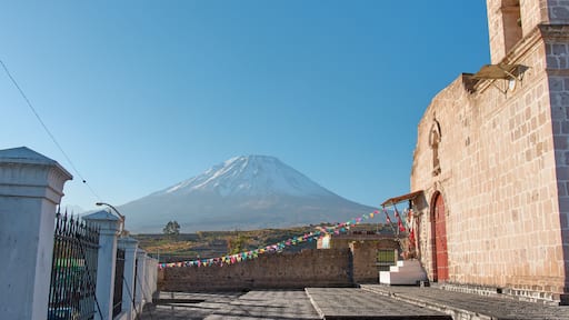 View of the church of Chiguata, in the background, the Misti volcano can be appreciated from afar, covered with snow on the summit."