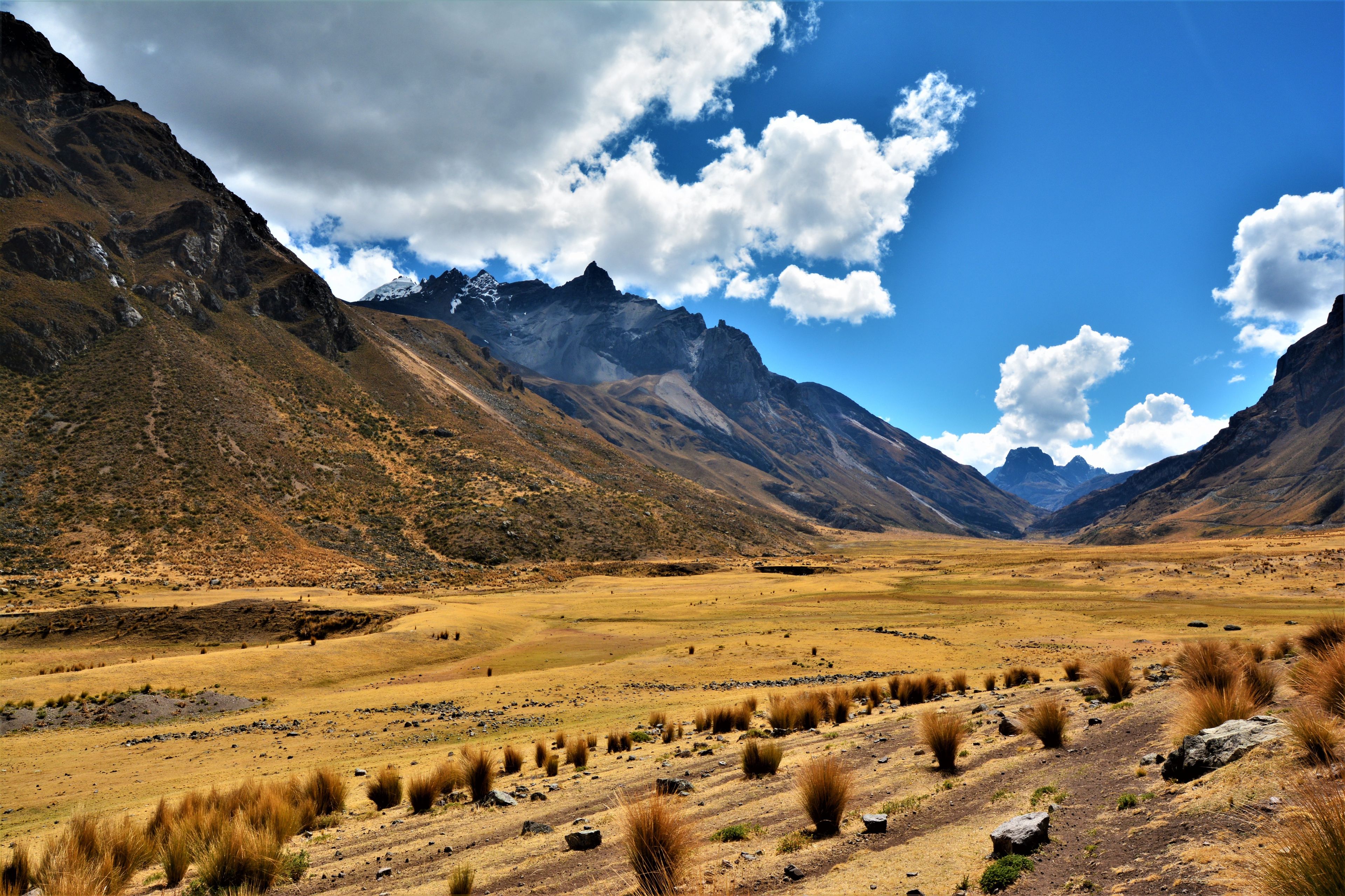 A mountainous landscape with a valley.