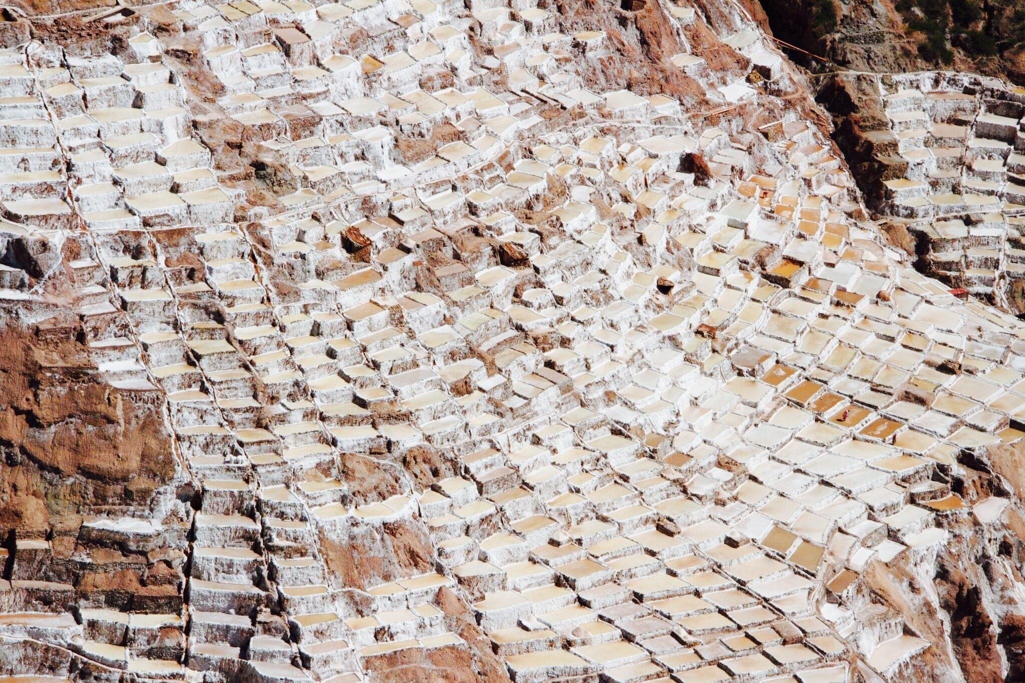 Terraced stone structures on a hillside.