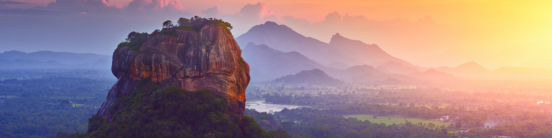Panoramic view of the famous ancient stone fortress Sigiriya (Lion Rock) on the island of Sri Lanka, which is a UNESCO World Heritage Site.